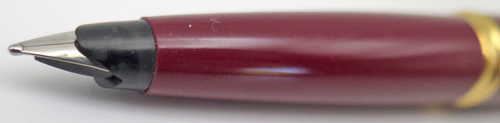 ITEM #6650 6651: PARKER 45 FOUNTAIN PEN IN BURGUNDAY. NOS. NIB IS OCTANIUM IN BROAD. Found in Susan Wirth's basement. Comes with Parker piston converter.